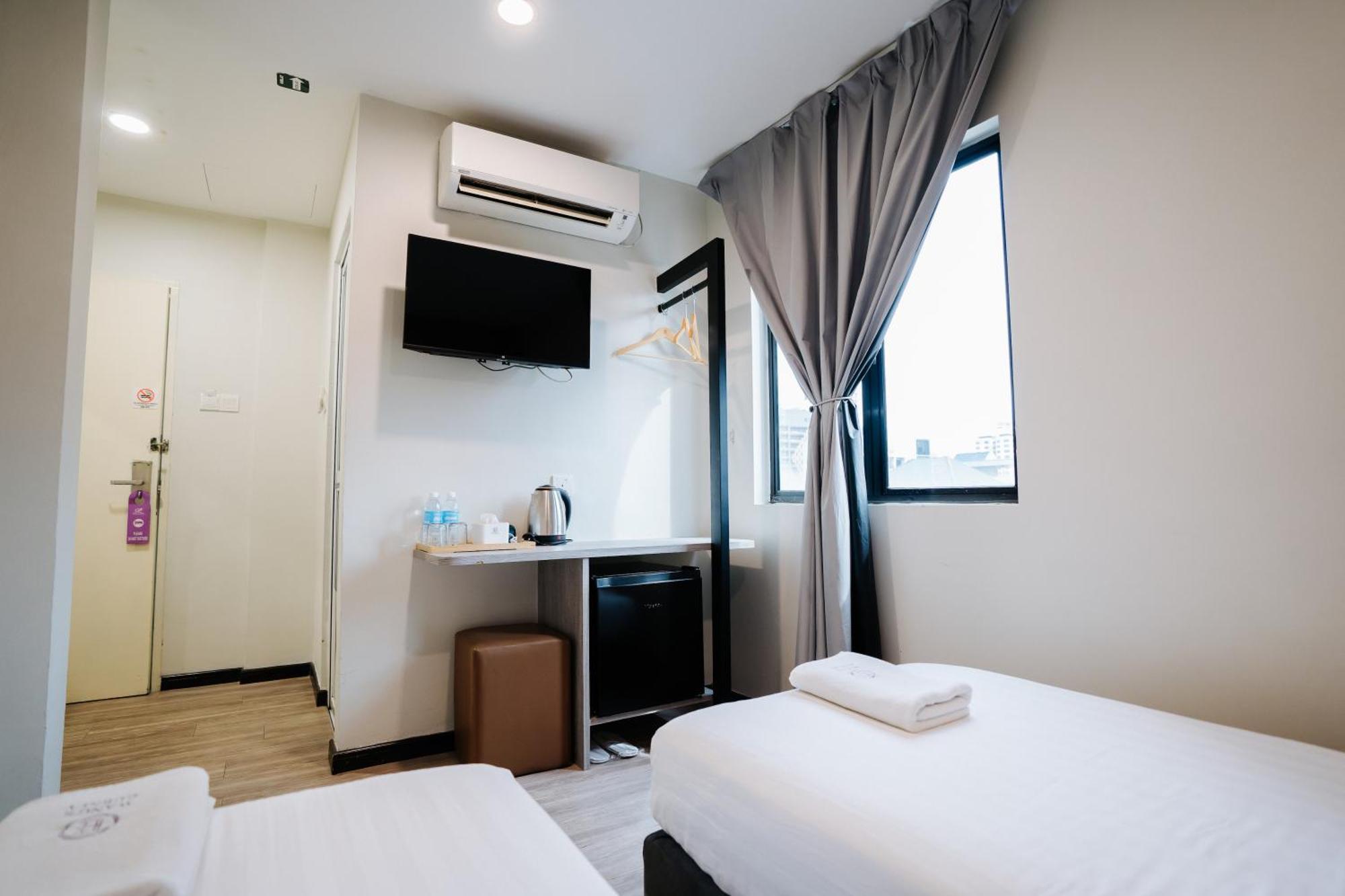 Wangs Hotel Gurney Drive Джордж Таун Екстериор снимка
